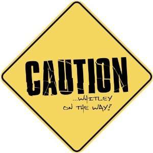   CAUTION  WHITLEY ON THE WAY  CROSSING SIGN