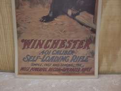 1909 WINCHESTER AD POSTER BEAR IN CABIN & HUNTER W/GUN  