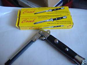 NEW SWITCHBLADE COMB OPENS WITH PUSH OF THE BUTTON  