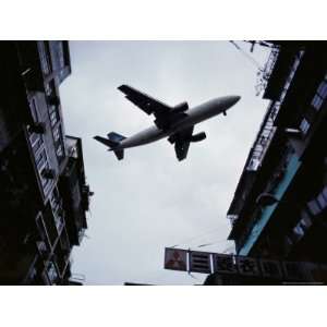  A Jet Soars Above the Crowded Streets of Hong Kong 