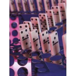  Studio Shot of Dominos Arranged on a Metal Stand Stretched 