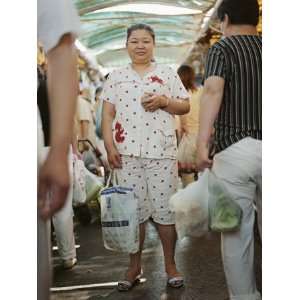  Woman Shopping in a Market in Her Pajamas in Shanghai 