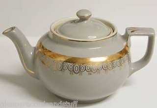 you are bidding on a triple marked hall china early