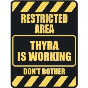   RESTRICTED AREA THYRA IS WORKING  PARKING SIGN