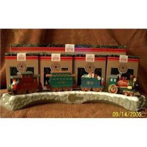 1991 Claus and company Railroad 5 piece set includes 4 ornaments and 