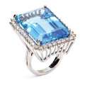 UNIQUE 18K WHITE GOLD DIAMOND AND LARGE BLUE TOPAZ COCKTAIL RING