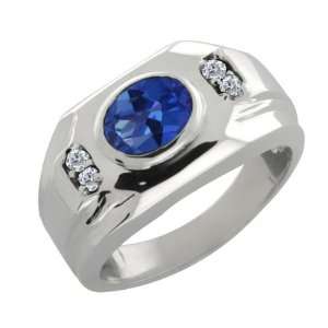   68 Ct Oval Sapphire Blue Mystic Topaz and Diamond 14k White Gold Ring