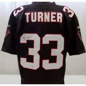  Signed Michael Turner Jersey   GAI   Autographed NFL 