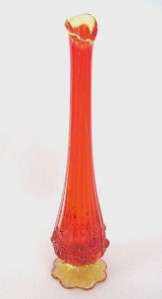 This auction is for a Mid Century Design amberina glass bud vase 