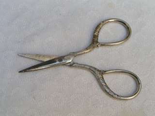  to offer a beautiful pair of vintage small ornate sewing scissors 