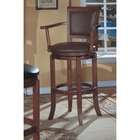   finish wood swivel bar stool with arms and brown vinyl padded seats