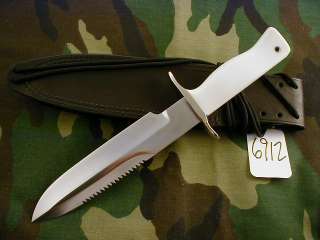 linen micarta handle in border patrol handle shape and black sheath 