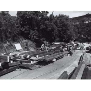 Workers Creating and Transporting Wooden Beams, Perdaniedda Group 