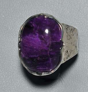 This gorgeous Sugilite gemstone crystal is a vibrant, deep purple 