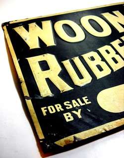 VINTAGE WOONSOCKET RUBBER BOOTS & SHOES TIN SIGN  