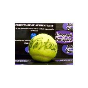 Ilie Nastase autographed Tennis Ball