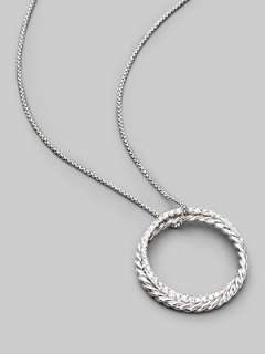   pavé diamonds, hanging elegantly from a sterling silver box chain