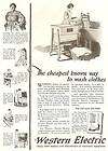 1922 WESTERN ELECTRIC~Woman Using Wringer Washer AD