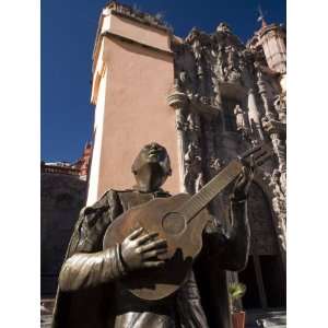  Bronze Statue of a Singing Mexican, in Front of the Temple 